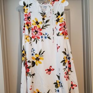 This is a never worn flowered dress.